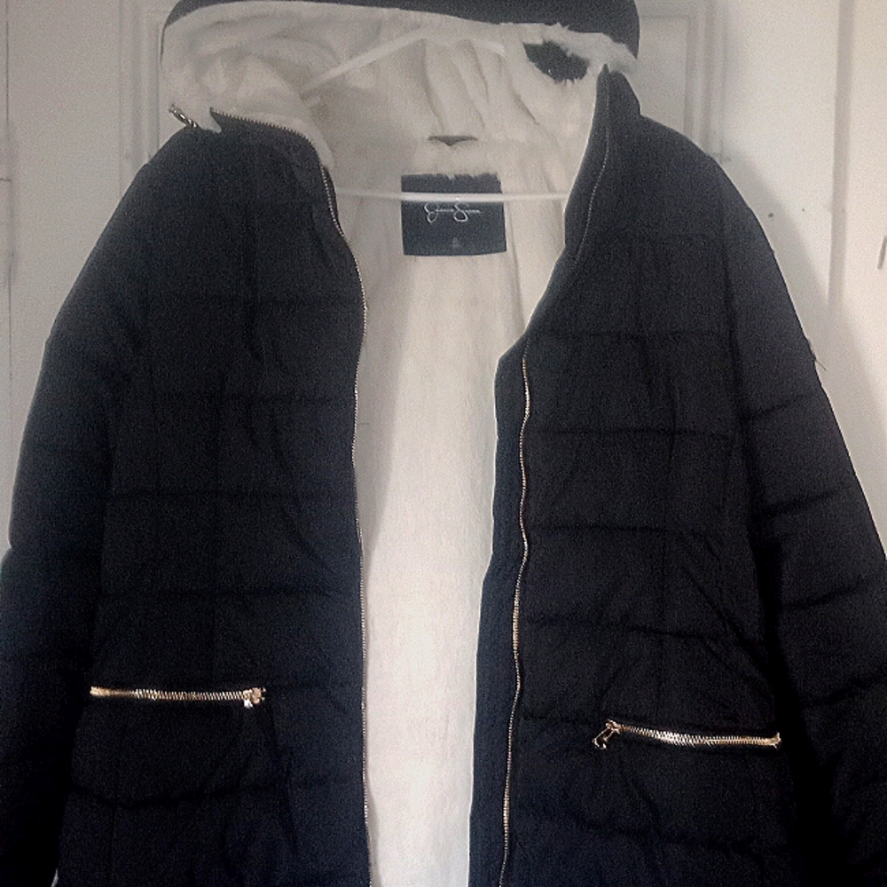 Jessica Simpson winter coat. Size Large, color black, Lined with white faux fur.